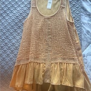 Chic Sleeveless yellow peplum tunic